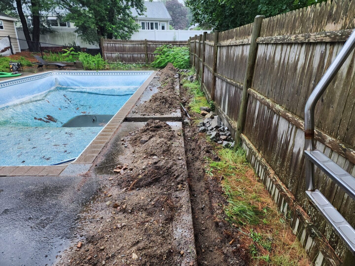 A pool is being dug out of the ground.